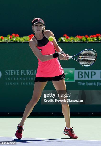 Galina Voskoboeva of Kazakhstan hits a backhand against Heather Watson of Great Britain during day three of the BNP Paribas Open at Indian Wells...