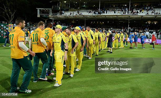 The teams shake hands after the 3rd KFC T20 International match between South Africa and Australia at PPC Newlands on March 09, 2016 in Cape Town,...