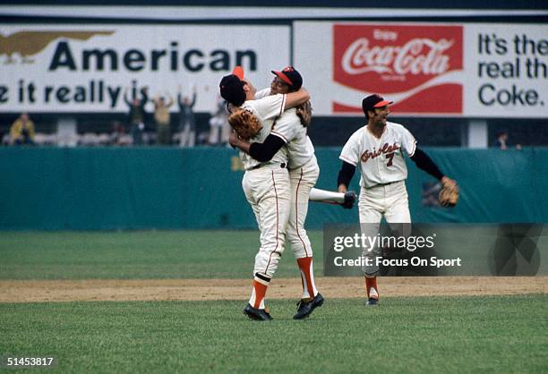 Brooks Robinson and Mike Cuellar of the Baltimore Orioles celebrate after winning Game Five the World Series against the Cincinnati Reds at Memorial...