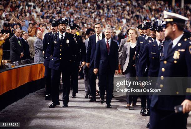 Jimmy Carter makes an appearance during the World Series featuring the Pittsburgh Pirates v Baltimore Orioles at Memorial Stadium in Baltimore,...