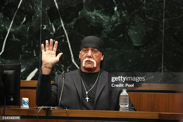Terry Bollea, aka Hulk Hogan, takes the oath in court during his trial against Gawker Media at the Pinellas County Courthouse on March 8, 2016 in St....