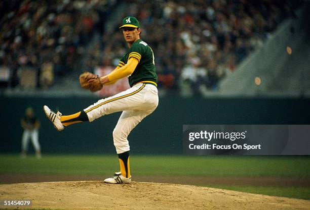 Ken Holtzman of the Oakland Athletics pitches against the Cincinnati Reds during the World Series at Oakland-Alameda County Coliseum in Oakland,...