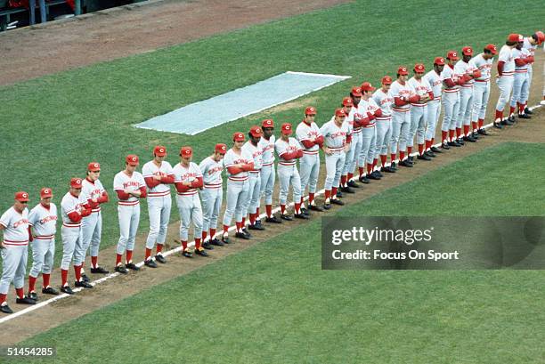 The Cincinnati Reds line up for player introductions prior to Game 1 of the 1975 World Series against the Boston Red Sox on October 11, 1975 at...