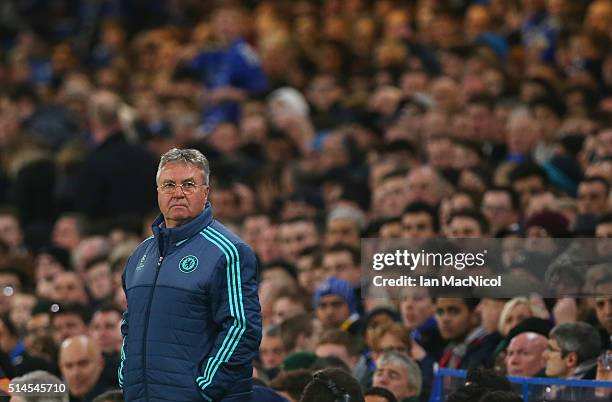 Chelseaâs manager Gus Hidddink looks on during the UEFA Champions League Round of 16 Second Leg match between Chelsea and Paris Saint-Germain at...