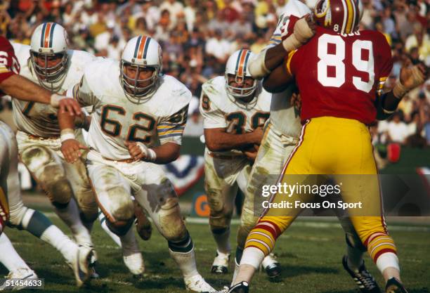 Larry Csonka of the Miami Dolphins runs against the Washington Red Skins during Super Bowl VIII at Memorial Coliseum in Los Angeles, California on...