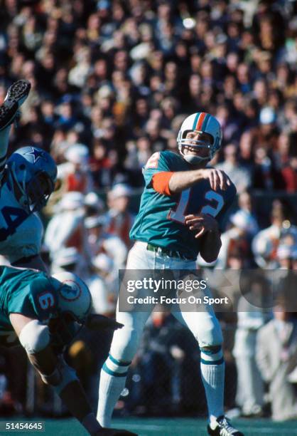 Bob Griese of the Miami Dolphins throws a pass during Super Bowl VI against the Dallas Cowboys at Tulane Stadium in New Orleans, Lousiana on January...