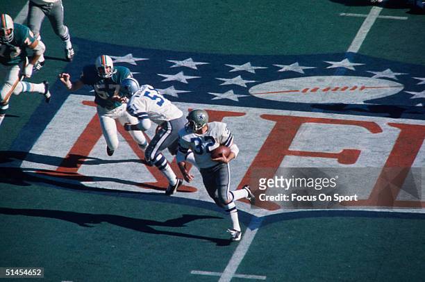 Walt Garrison of the Dallas Cowboys decides to run for it during Super Bowl VI against the Miami Dolphins at Tulane Stadium in New Orleans, Lousiana...