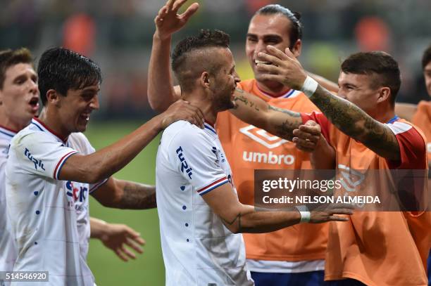 Nicolas Lopez of Uruguay's Nacional, celebrates after scoring against Brazil's Palmeiras, during their 2016 Copa Libertadores football match held at...