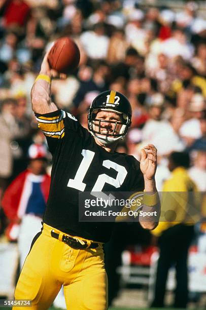 Terry Bradshaw quarterback for the Pittsburgh Steelers throws a pass during Super Bowl XIV against the Los Angeles Rams at the Rose Bowl on January...