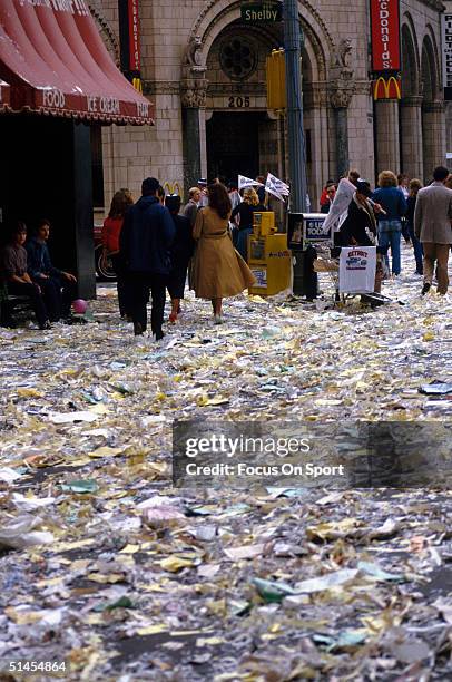 The streets of Detroit are piled high with celebratory confetti after the Victory Parade when the Detroit Tigers defeated the Kansas City Royals...