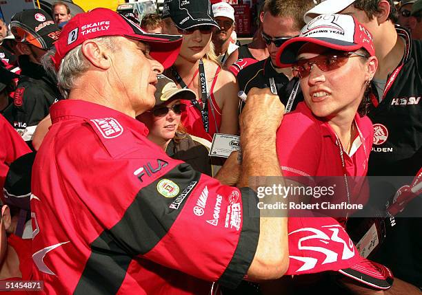 Peter Brock of the Holden Racing Team signs autographs for fans as he prepares for the Bathurst 1000 which is round ten of the 2004 V8 Supercar...