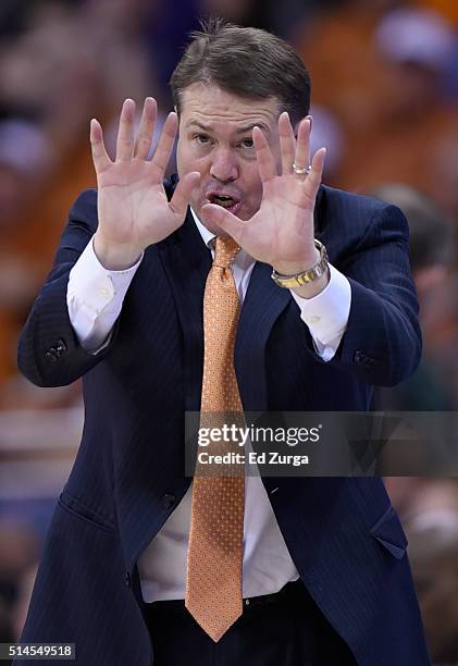 Head coach Travis Ford of the Oklahoma State Cowboys gestures as he watches team during a game Kansas State Wildcats in the second half of the first...