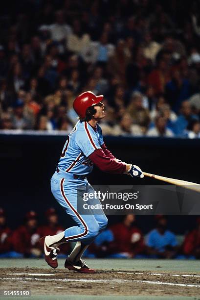 Mike Schmidt of the Philadelphia Phillies swings and connects against the Kansas City Royals during the World Series at Royals Stadium in Kansas...