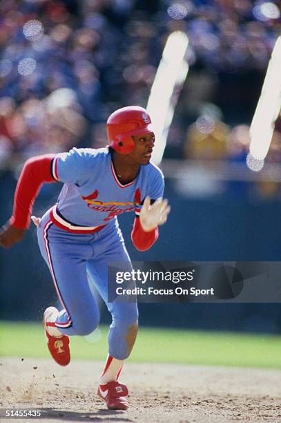 Willie McGee of the St. Louis Cardinals runs the bases during the World Series against the Milwaukee Brewers at County Stadium in October 1982 in...