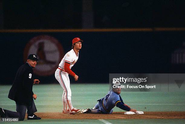 Second baseman Tom Herr of the St. Louis Cardinals and Paul Molitor of the Milwaukee Brewers watch the play at first base during the World Series at...