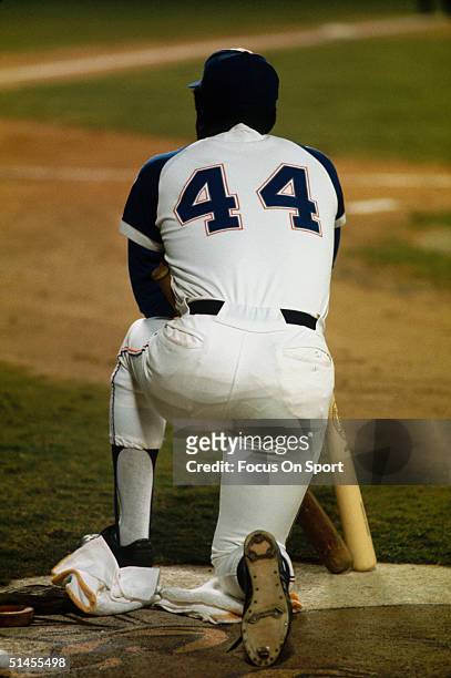 Outfielder Hank Aaron of the Atlanta Braves waits for his turn at bat during a circa 1970s game at Atlanta-Fulton County Stadium in Atlanta, Georgia.