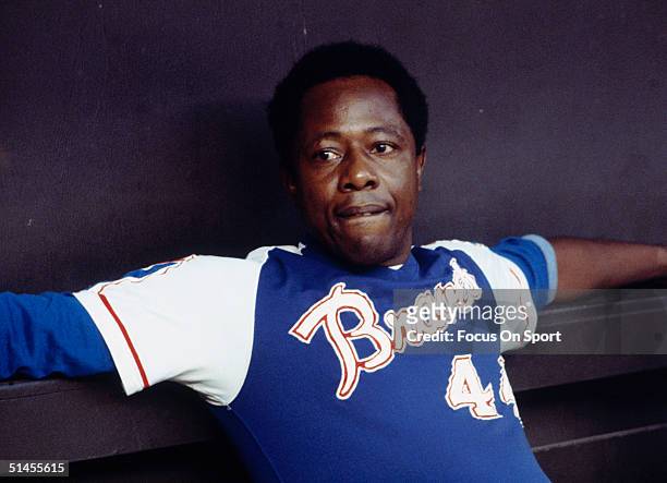 Outfielder Hank Aaron of the Atlanta Braves relaxes in the dugout during a circa 1970s game.