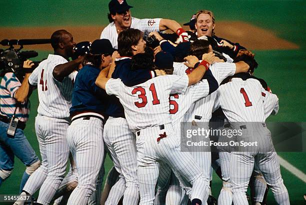 Minnesota Twins players celebrate after winning Game Seven of the 1991 World Series against the Atlanta Braves at the Metrodome on October 27, 1991...