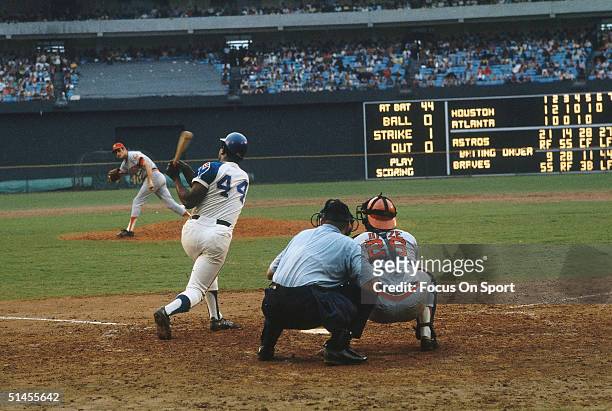 Outfielder Hank Aaron of the Atlanta Braves bats against the Houston Astros at Atlanta-Fulton County Stadium on September 30, 1973 in Atlanta,...