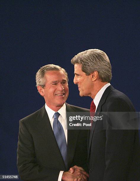 President Geaorge W. Bush shakes hand with presidential candidate US Senator John Kerry during the Presidential debate at Washington University...