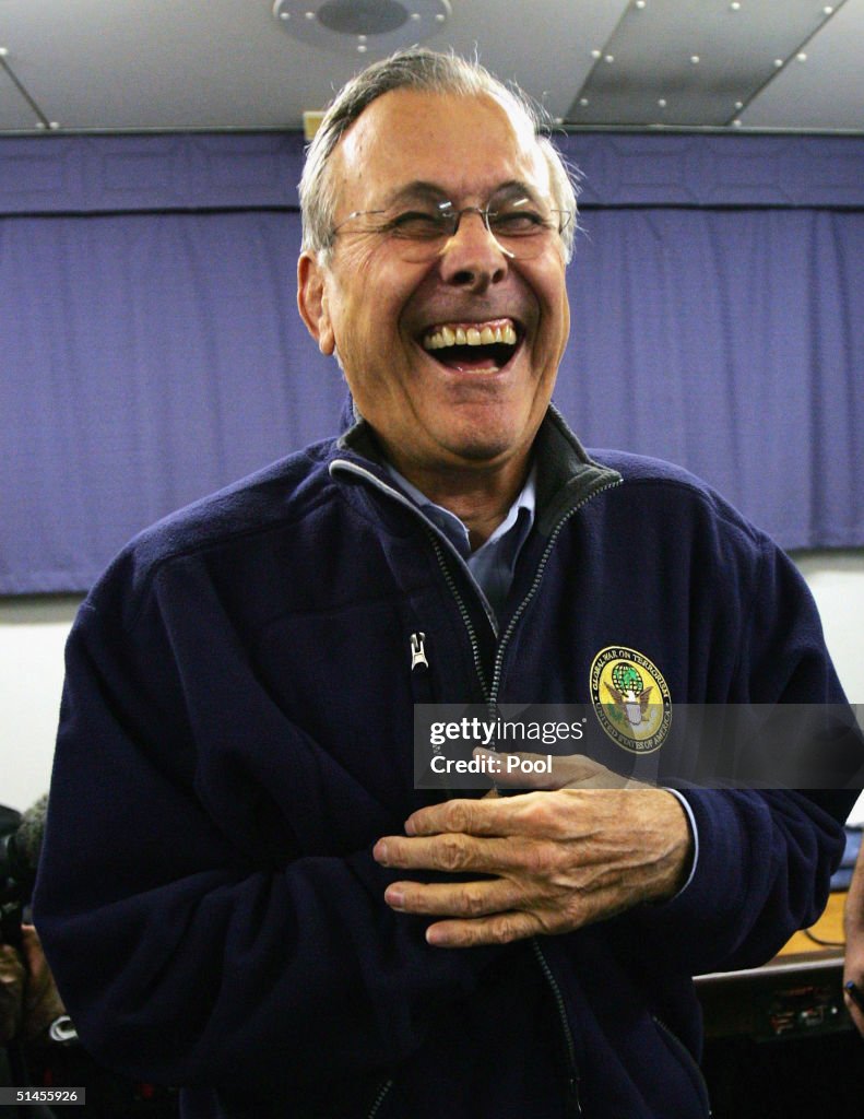 Secdef Rumsfeld U.S. Secretary of Defense Donald Rumsfeld laughs as he speaks to a ...