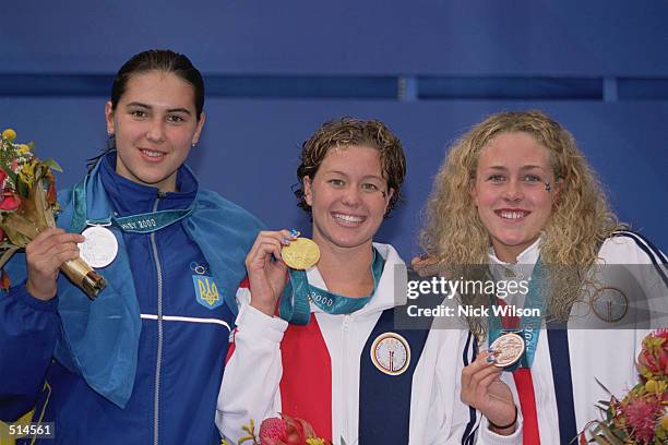 Portrait of medal winners Yana Klochkova of Ukraine , Brooke Bennett of the United States , and Kaitlin Sadeno of the United States after the Women's...