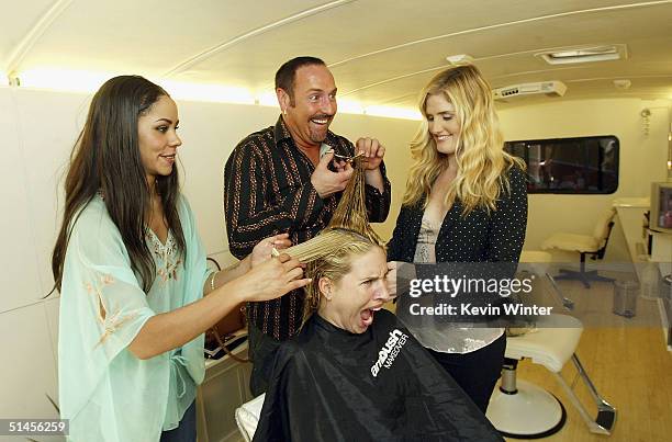 Celebrity stylists Gigi Berry , William Whatley and Mary Alice Haney work on an ambushed Barbara O'Toole at Ambush Makeover's "Its A Whole New Bus...