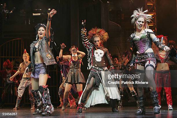 Chorus singers and dancers perform for "We Will Rock You" at the Lyric Theatre on October 8, 2004 in Sydney, Australia.