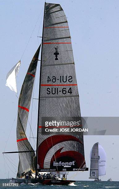 The Swiss team Alinghi raises the spinaker during the four-day match-racing pre-regata for the Luis -Vuitton second act before the 32nd Americas cup...