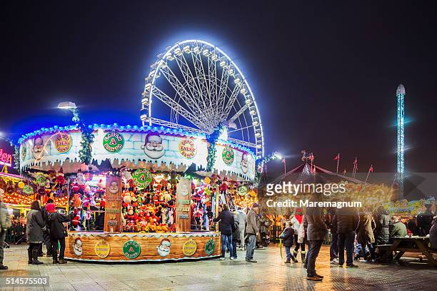 london's winter wonderland in hyde park - fairground ride stock pictures, royalty-free photos & images