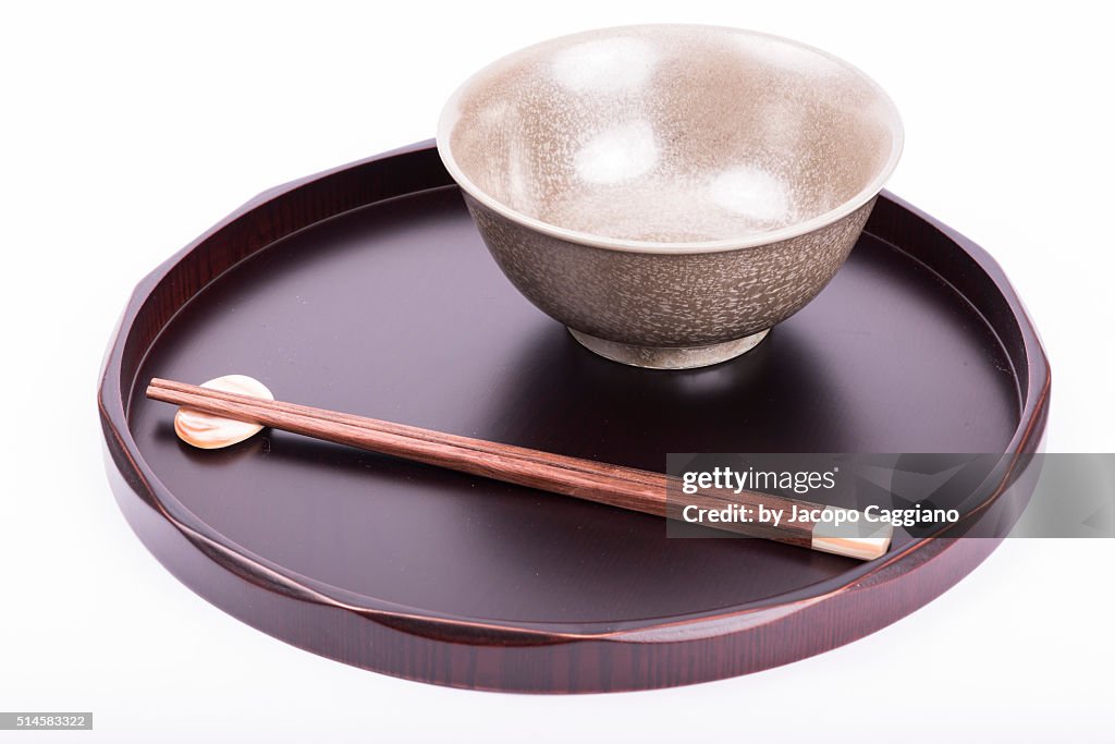 Japanese Bowl with chopsticks on a serving plate