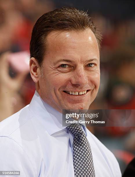Assistant coach, Martin Gelinas of the Calgary Flames looks on from the bench during the game against the Nashville Predators at Scotiabank...