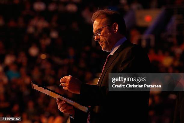 Head coach Kurt Rambis of the New York Knicks looks over his clipboard before the first half of the NBA game against the Phoenix Suns at Talking...
