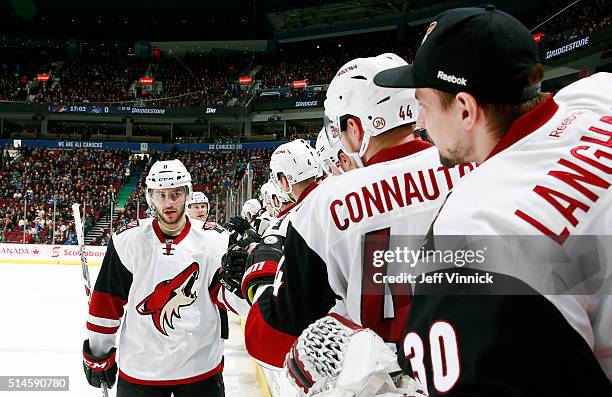 Tobias Rieder of the Arizona Coyotes is congratulated at the bench after scoring against the Vancouver Canucks during their NHL game at Rogers Arena...