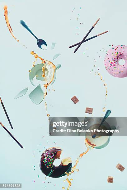 mad tea party - high speed photography stock pictures, royalty-free photos & images