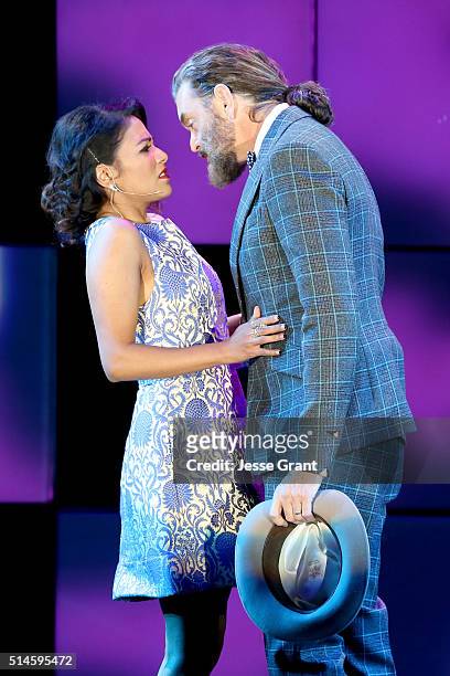 Actors Karen David and Timothy Omundson perform onstage during the 24th and final "A Night at Sardi's" to benefit the Alzheimer's Association at The...