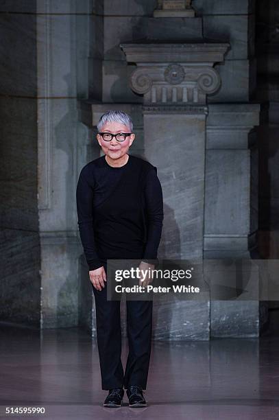 The designer walks the runway during the Moon Young Hee show as part of the Paris Fashion Week Womenswear Fall/Winter 2016/2017 on March 9, 2016 in...
