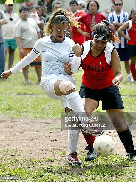 Guatemalan footballer Kimberley , member of the female soccer team "Estrellas de la Linea" , constituted by prostitutes, vies for the ball with...