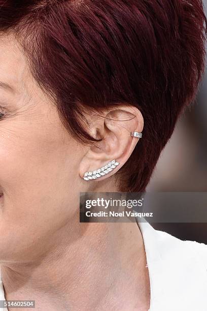 Sharon Osbourne, jewelery detail, visits "Extra" at Universal Studios Hollywood on March 9, 2016 in Universal City, California.