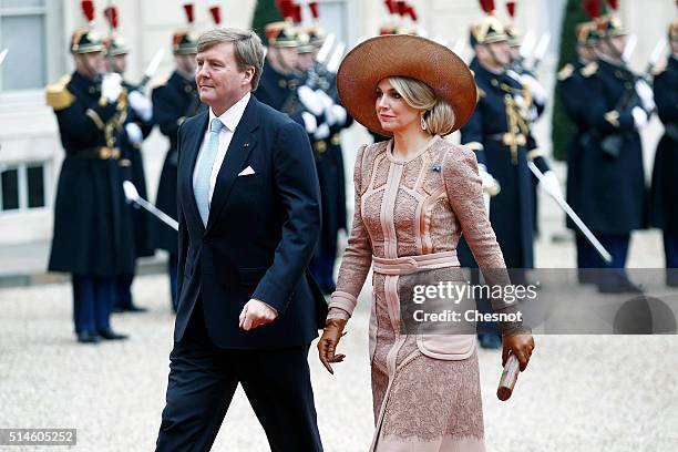 Queen Maxima of the Netherlands and King Willem-Alexander of the Netherlands arrive to attend a meeting with French President Francois Hollande at...
