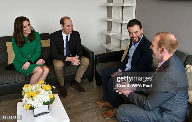 Catherine, Duchess of Cambridge and Prince William, Duke of Cambridge speak with former patient Jonny Benjamin , and Neil Laybourn during their visit...