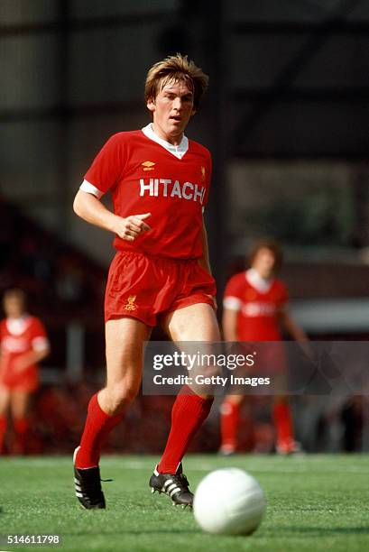Liverpool striker Kenny Dalglish wearing a 'Hitachi' sponsor shirt ,in action during a First Division Match at Anfield in 1979 in Liverpool, England.