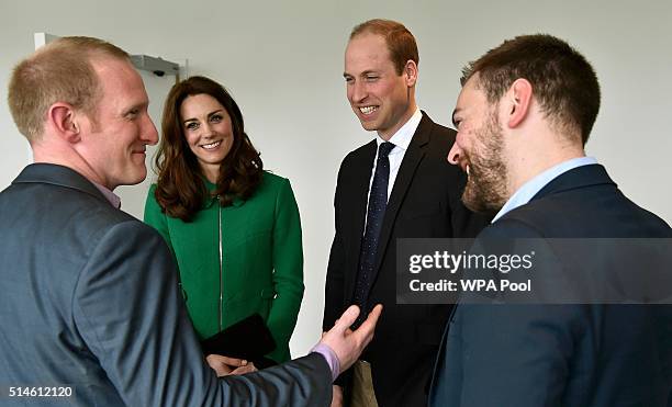 Catherine, Duchess of Cambridge and Prince William, Duke of Cambridge speak with former patient Jonny Benjamin , and Neil Laybourn during their visit...