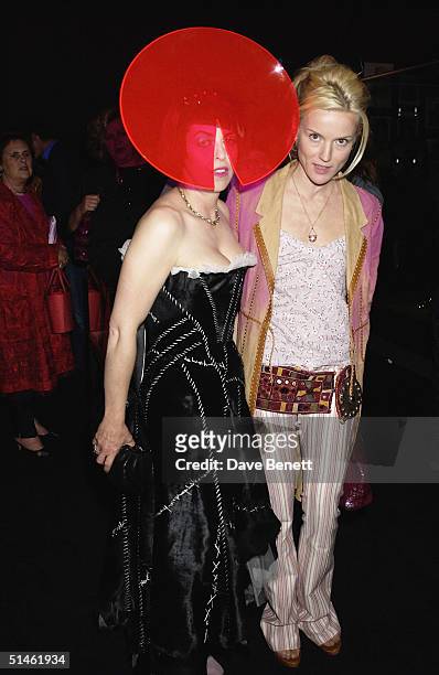 Isabella Blow and Daphne Guiness attend the "When Phillip met Isabella" Exhibition featuring a range of Phillip Treacey Hats designed for Isabella...
