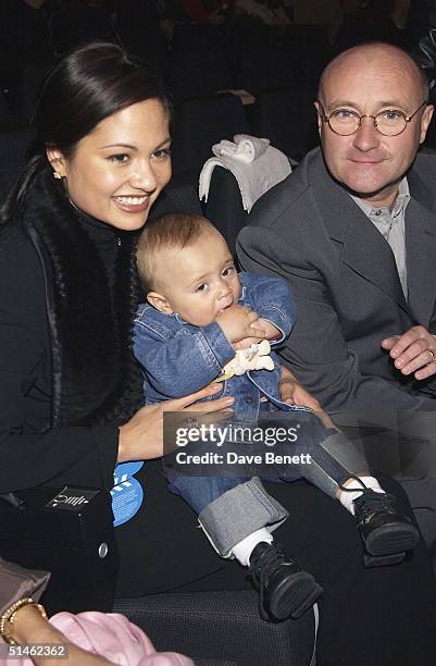 Phil Collins and his family attend the opening of the Walt Disney Studios in Disneyland Paris on March 15, 2002 in Paris.