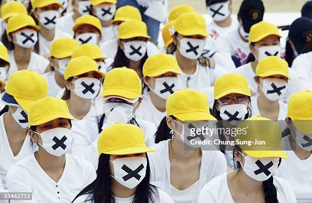 South Korean prostitute attend a demonstration on October 11 2004, in Seoul, South Korea. The South Korean government began enforcing new laws last...
