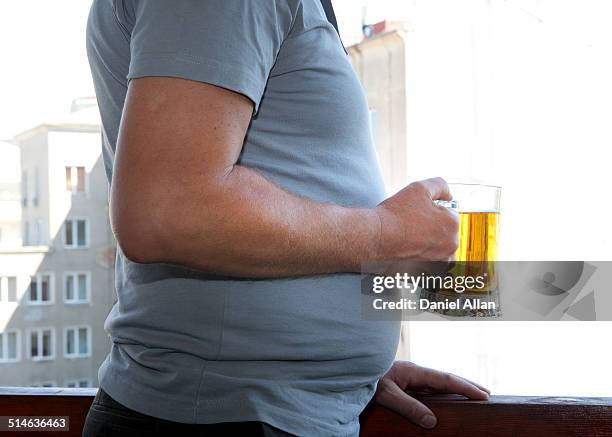 unhealthy drinking - pens stockfoto's en -beelden