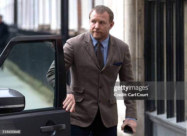 British film director Guy Ritchie arrives at the Royal Courts of Justice, Strand on March 10, 2016 in London, England. Mr Ritchie is currently...