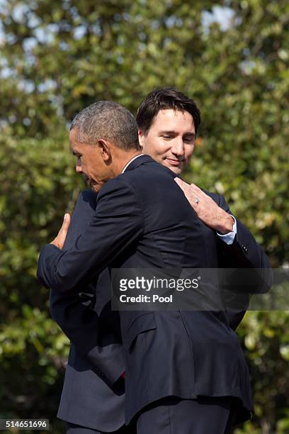 President Barack Obama hugs Canadian Prime Minister Justin Trudeau during an arrival ceremony on the South Lawn of the White House, March 10, 2016 in...