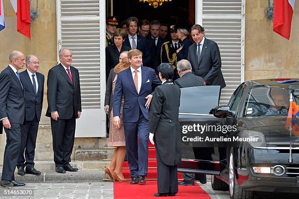 King Willem-Alexander leaves the Senate after a meeting with the President of the Senate Gerard Larcher on March 10, 2016 in Paris, France. Queen...